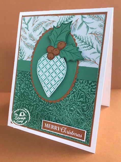 What fun technique do you see on this card? The technique I used on this card is an oldie but a goodie! I'm on a mini vacation and have limited supplies so had to look around my kitchen for something to use to create a background. Have you figured it out? See my blog post here for details: https://wp.me/p59VWq-bm9. #stampinup #technique #thestampcamp #christmas